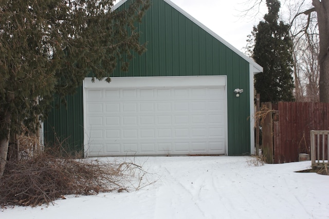 view of snow covered garage