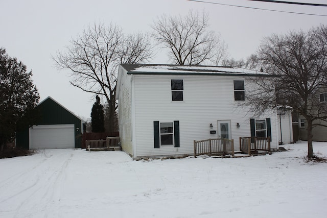 view of front of home featuring an outbuilding and a garage