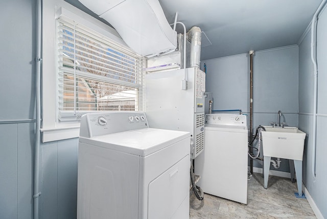 laundry area with laundry area and washer and clothes dryer