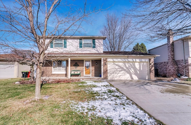 view of property with a porch, a garage, and a front yard