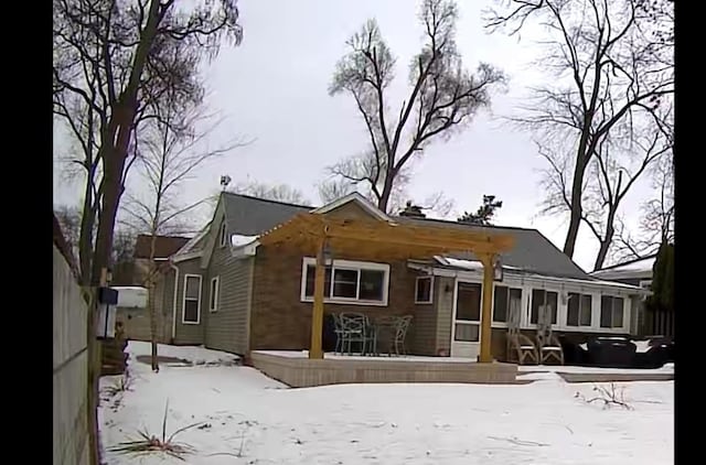 view of snow covered property