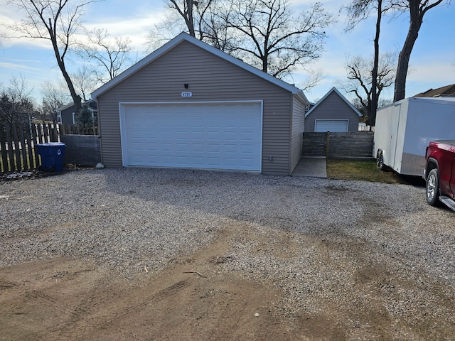 detached garage with fence