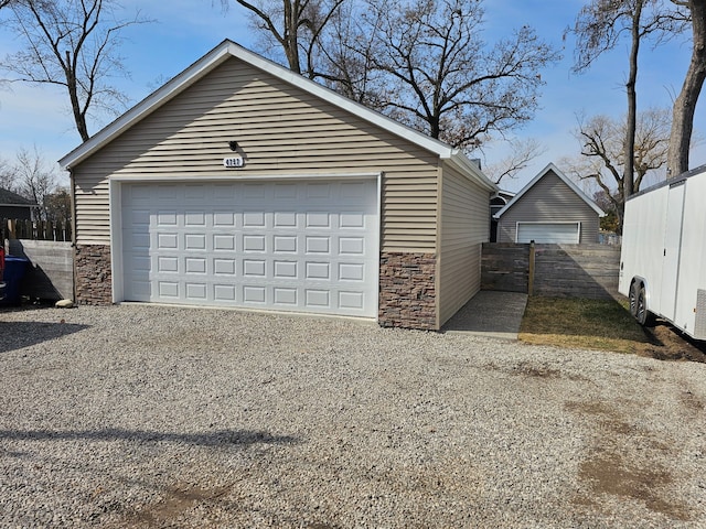 detached garage with fence