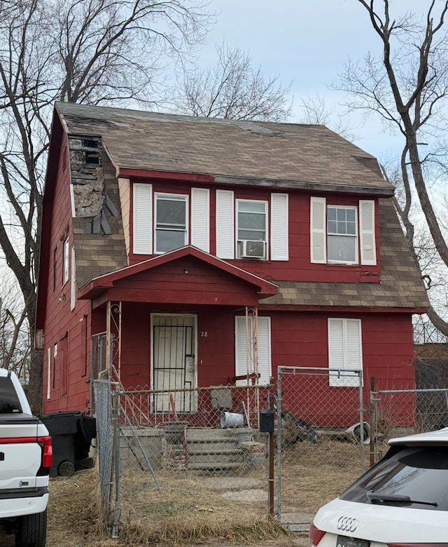 view of front of house with covered porch and cooling unit