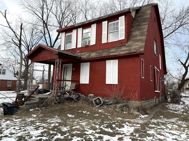 view of front of property with cooling unit