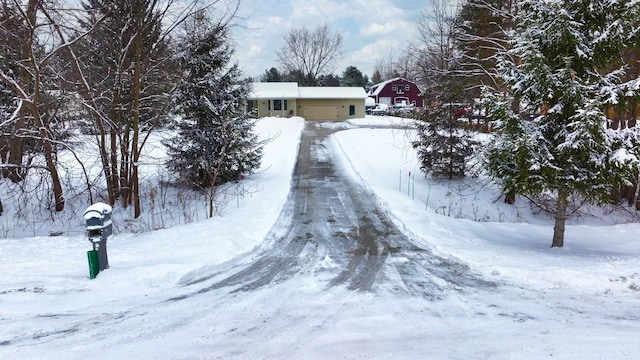 view of yard layered in snow