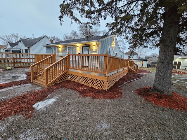 rear view of house with a deck