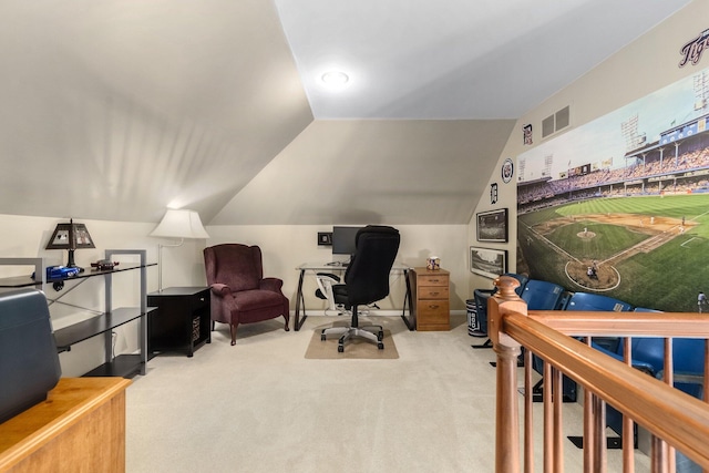 office featuring vaulted ceiling, carpet, visible vents, and baseboards