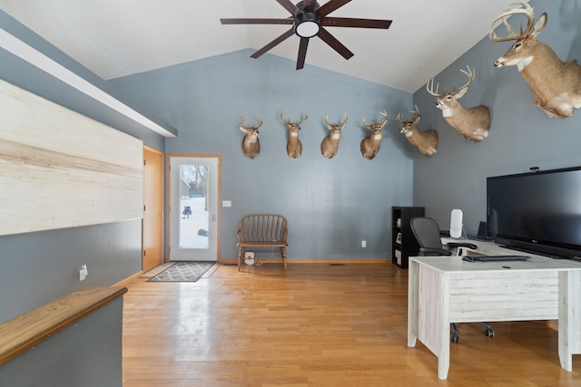 14113 Grandview Dr, Cement City, MI 49233 - home office featuring vaulted ceiling, a ceiling fan, and wood finished floors