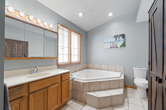 14113 Grandview Dr, Cement City, MI 49233 - bathroom featuring tile patterned floors, toilet, lofted ceiling, a tub with jets, and vanity