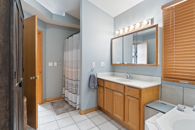 14113 Grandview Dr, Cement City, MI 49233 - full bath with baseboards, tile patterned floors, and vanity