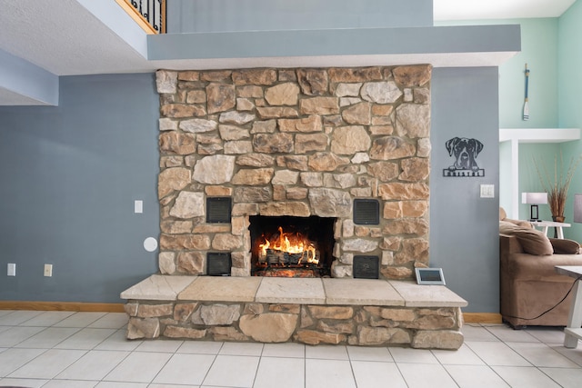14113 Grandview Dr, Cement City, MI 49233 - room details featuring baseboards, a stone fireplace, and visible vents