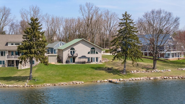14113 Grandview Dr, Cement City, MI 49233 - exterior space featuring a chimney, a yard, and a water view