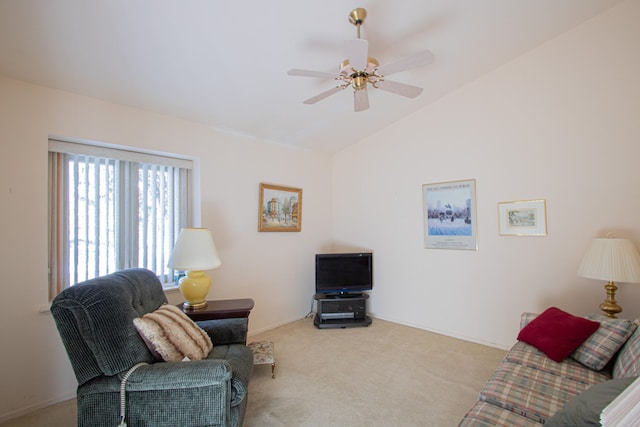 living room featuring vaulted ceiling, light colored carpet, and ceiling fan