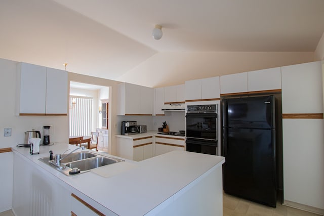 kitchen with white cabinets, vaulted ceiling, black appliances, and kitchen peninsula