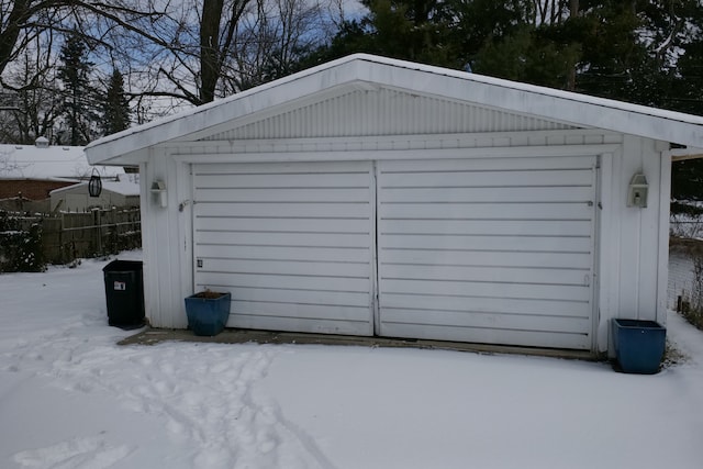 view of snow covered garage