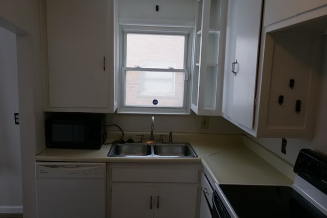 kitchen with black microwave, white cabinets, electric stove, light countertops, and dishwasher