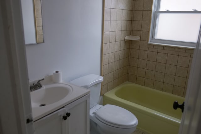 full bath with toilet, shower / tub combination, and vanity