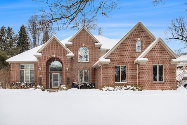 traditional home with brick siding