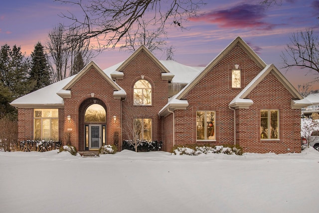 traditional-style house with brick siding