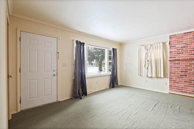 carpeted empty room featuring crown molding