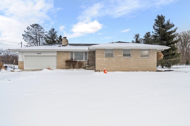 single story home with a garage