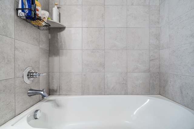 full bath with a tub to relax in