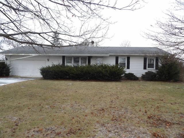 single story home with a front lawn and a garage