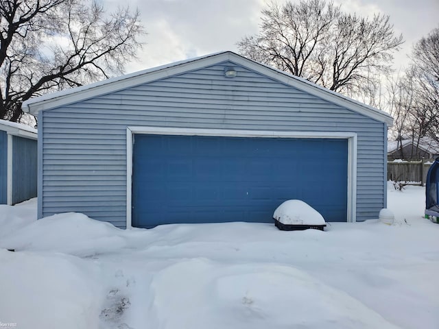 view of snow covered garage