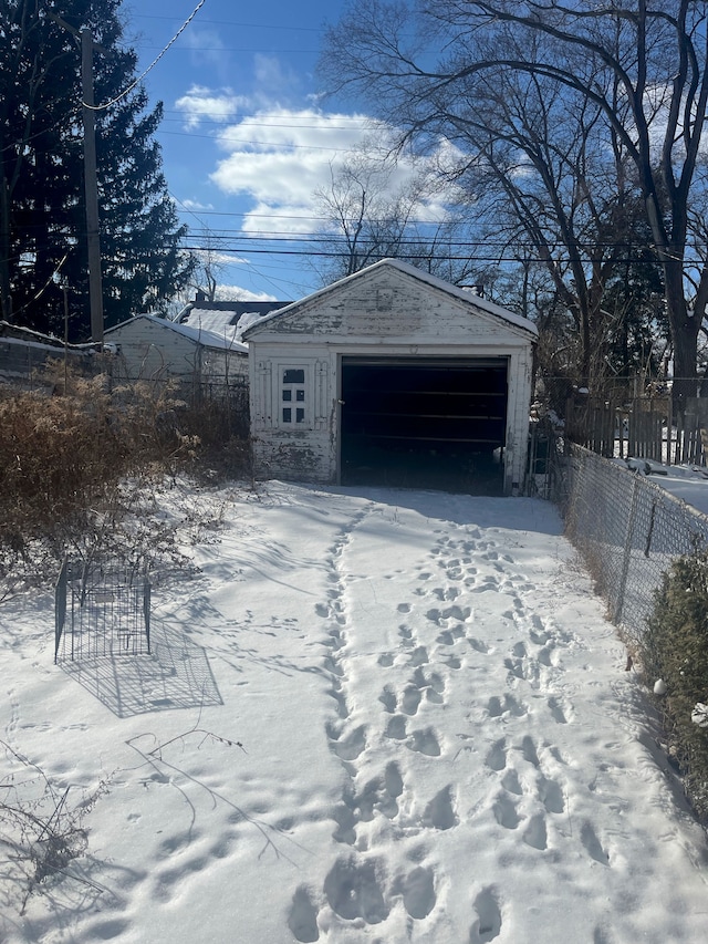 view of snow covered garage