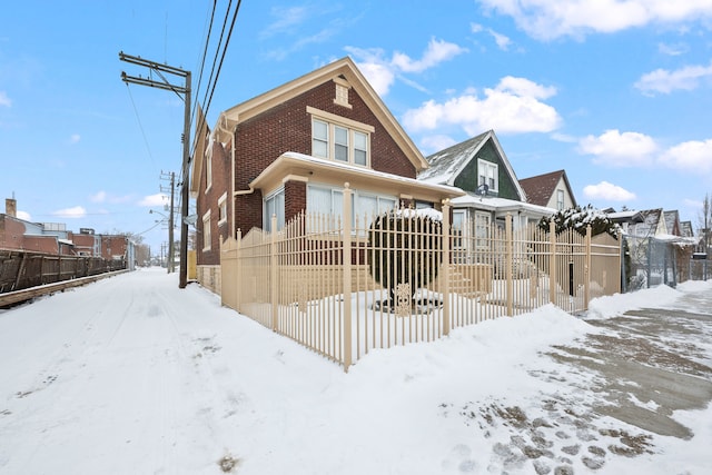 view of snow covered property