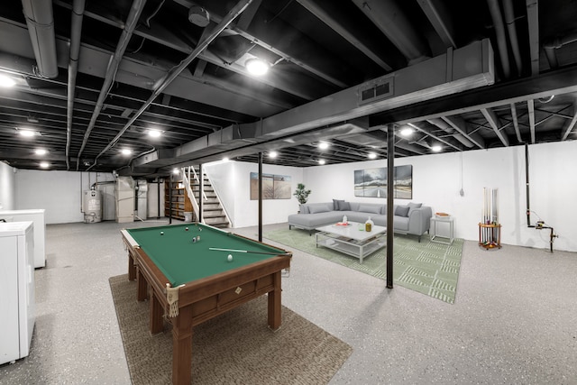 playroom featuring washer / dryer, billiards, water heater, and speckled floor