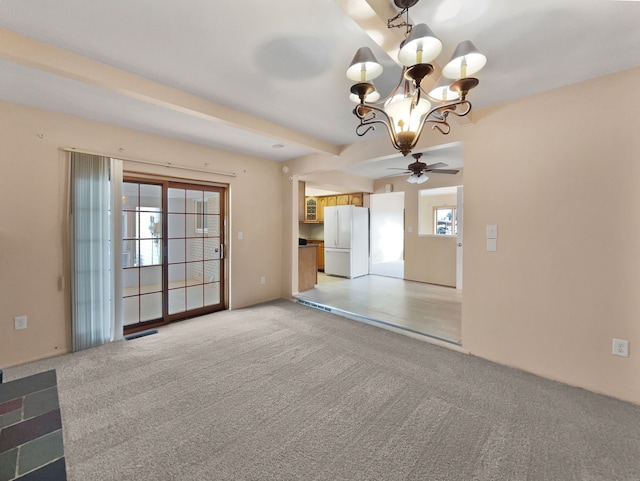 interior space with light carpet and a chandelier