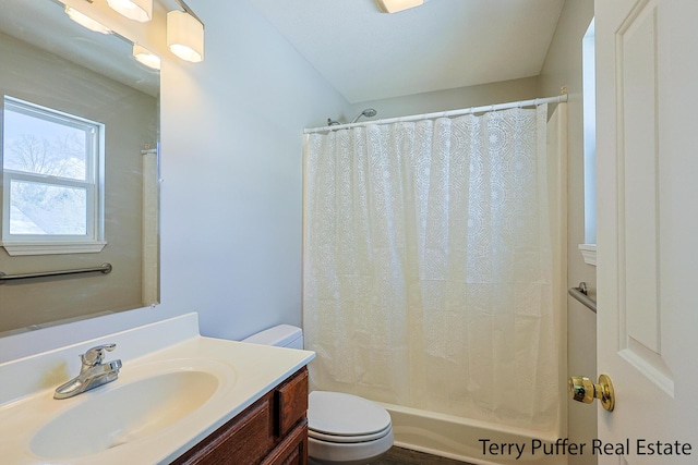 full bathroom featuring vanity, toilet, and shower / bath combo with shower curtain