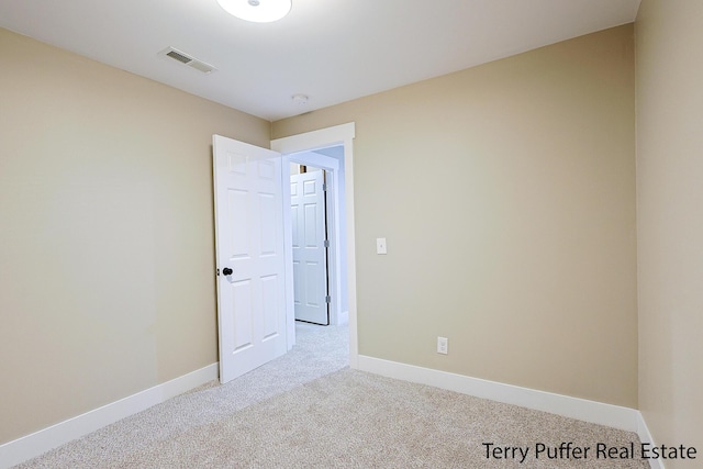 view of carpeted spare room