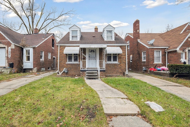 view of front of property with a front lawn