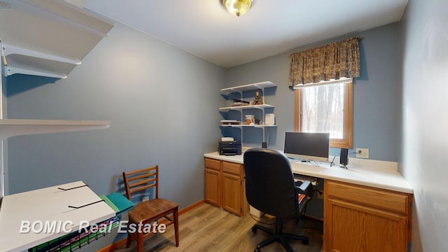 home office with light wood-type flooring