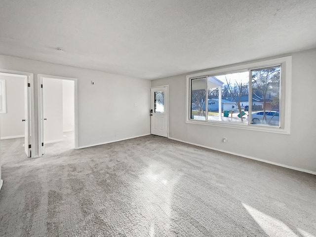 interior space featuring a textured ceiling