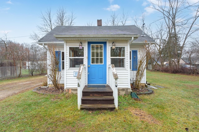 view of outdoor structure with a yard