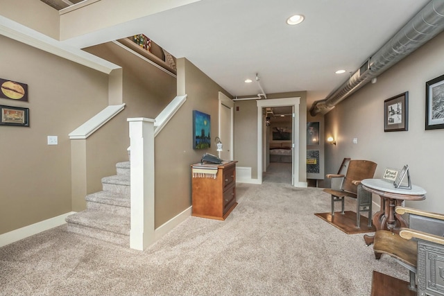 interior space featuring light colored carpet