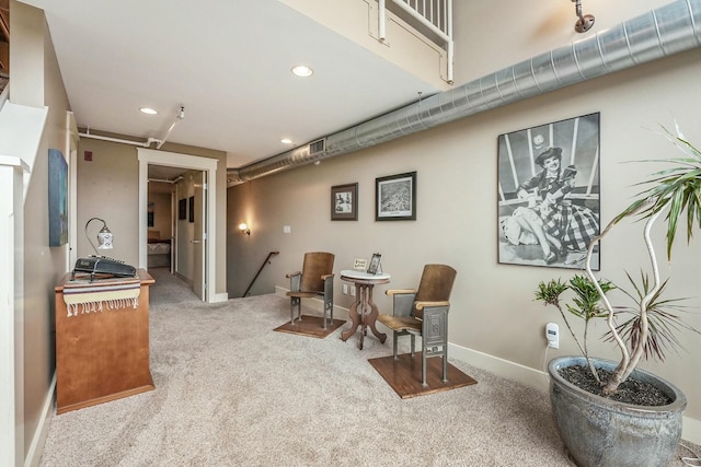 living area with carpet floors