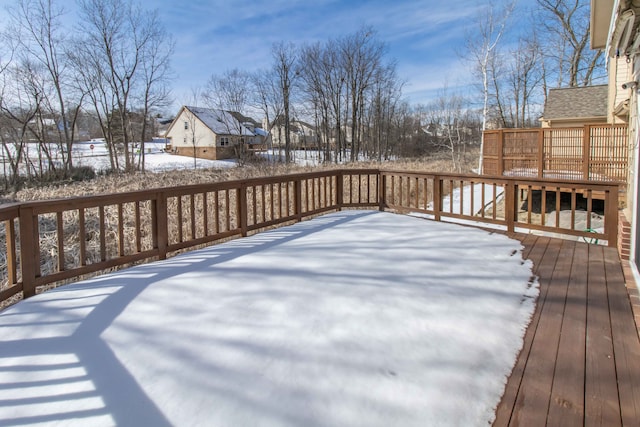 view of snow covered deck