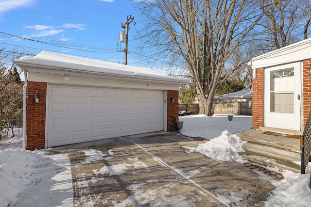 view of snow covered garage