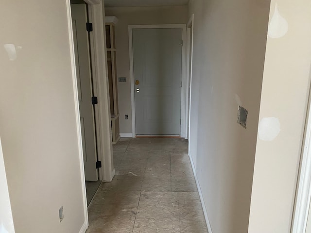 corridor with baseboards