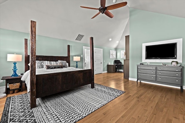 bedroom with high vaulted ceiling, ceiling fan, and wood-type flooring