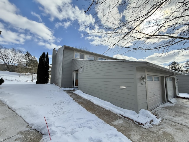 exterior space featuring a garage