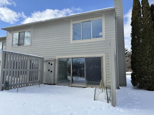 view of snow covered property