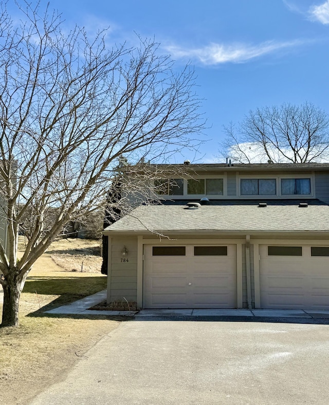 garage with driveway