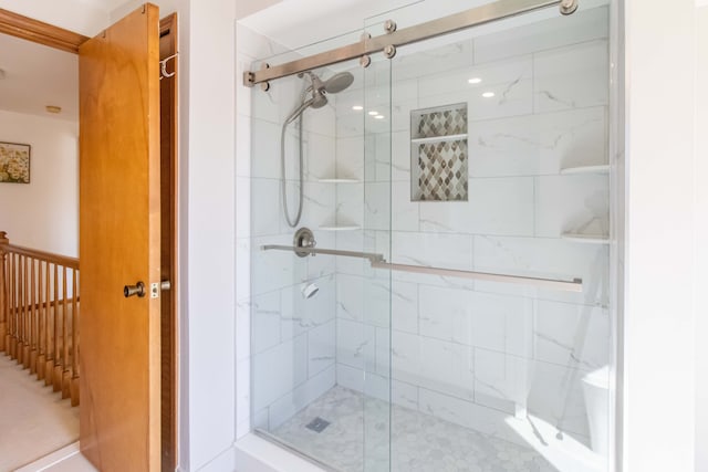 bathroom featuring a shower stall