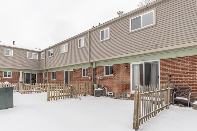 view of snow covered house